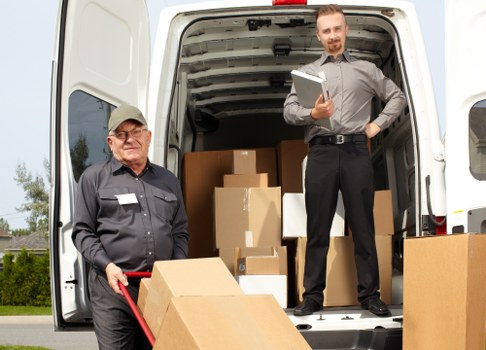 Assorted cardboard boxes and protective packing materials for local removals