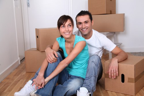 Local office movers preparing equipment for transport in Wandsworth
