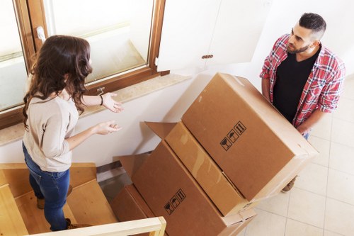 Packed boxes and furniture ready for a flat move in Wandsworth