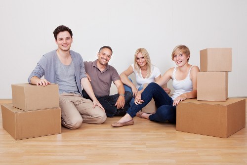 Packed office boxes and furniture ready for a business move