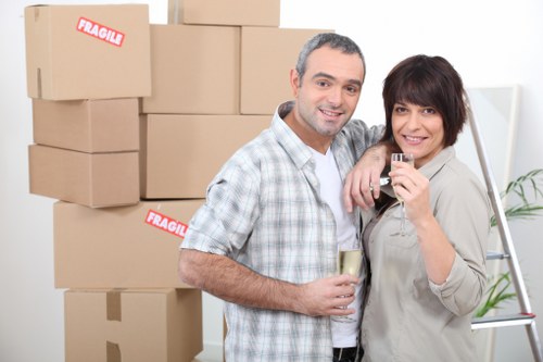 Careful loading of household items from a Wandsworth apartment building